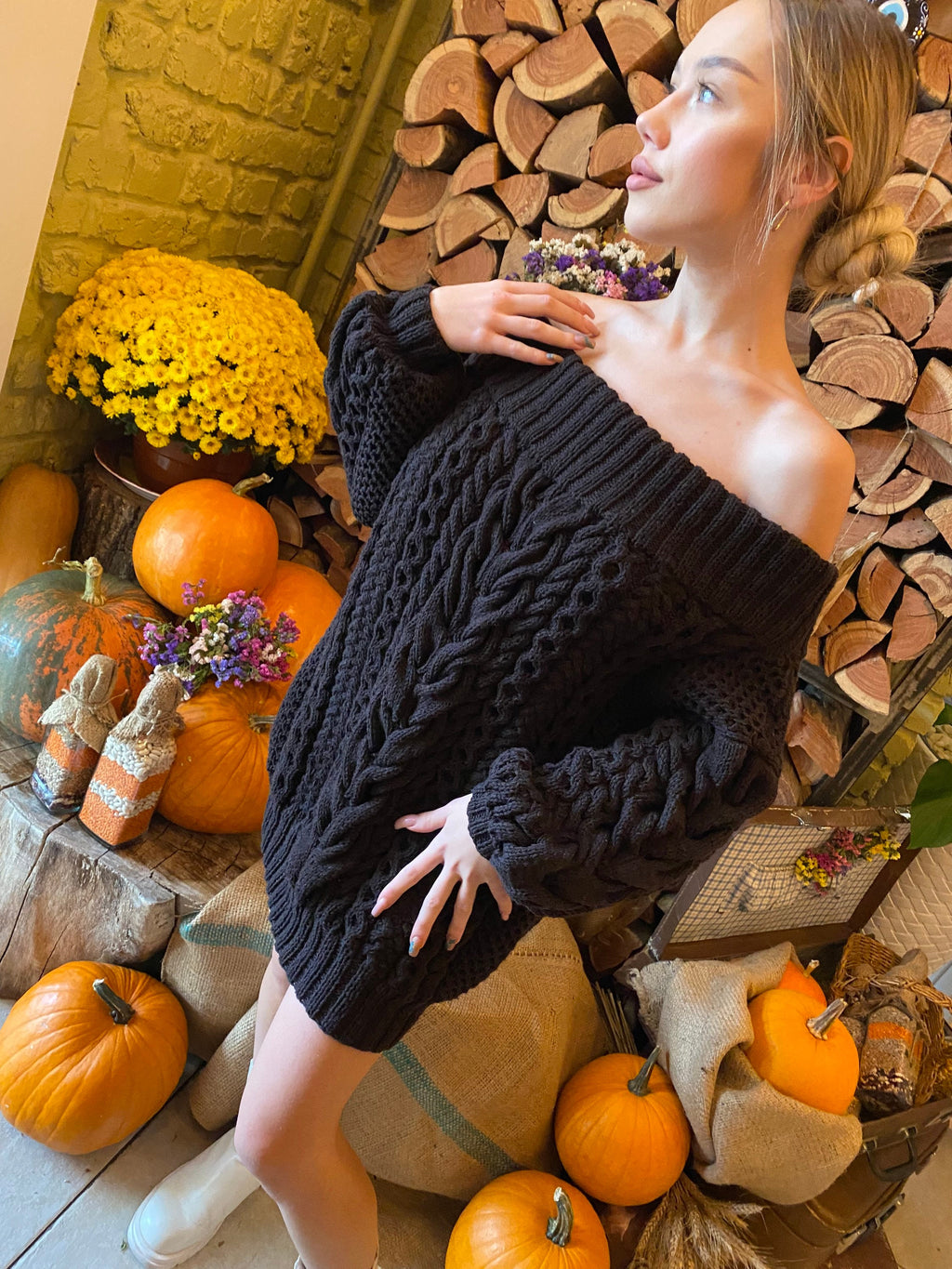 Hand knit merino sweater black dress for women Cable knit sweater open shoulders Long women’s wool sweater braids knit dress one shoulder